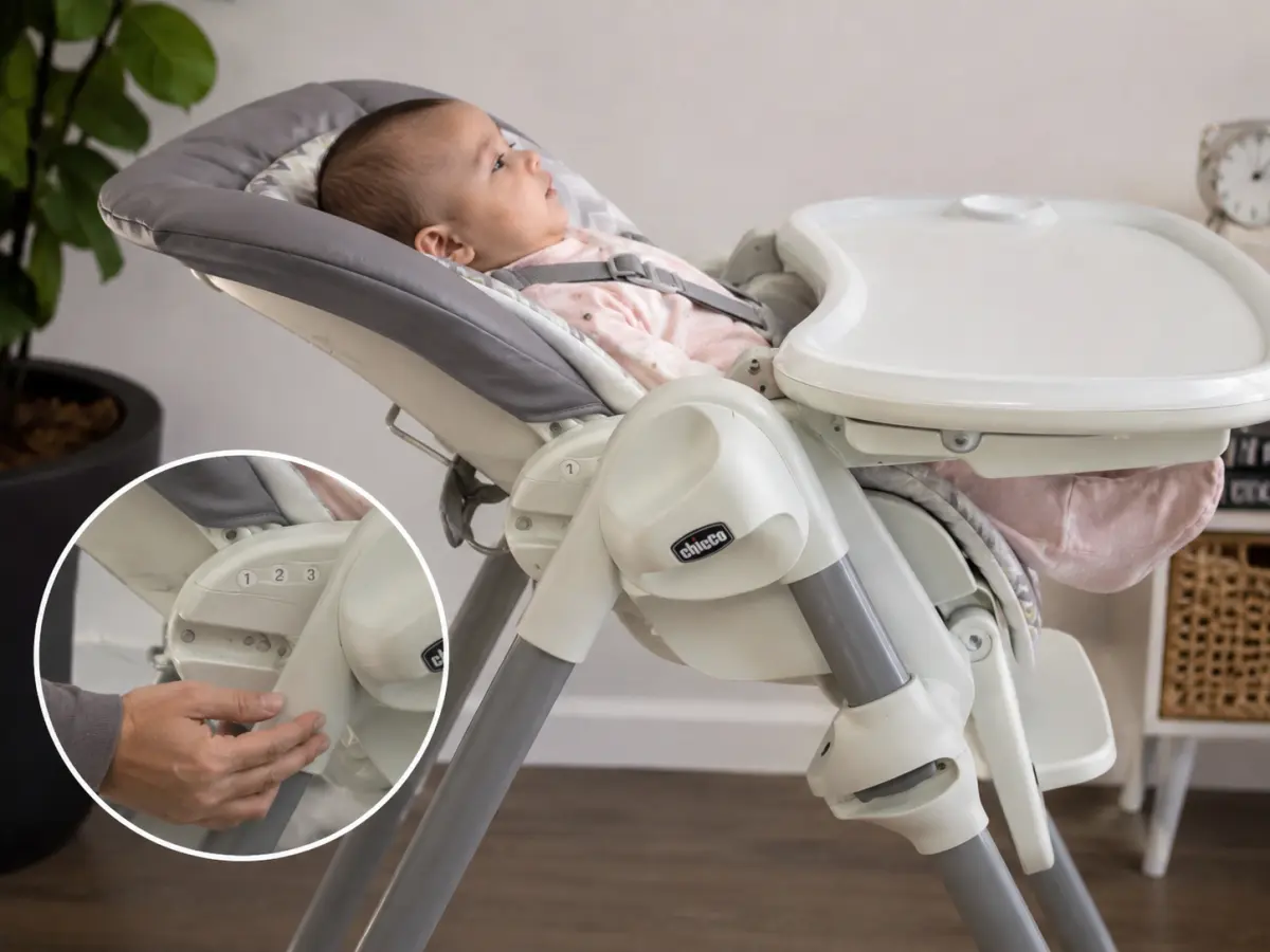 A reclining high chair seat set back for a younger baby, with the manual open beside it